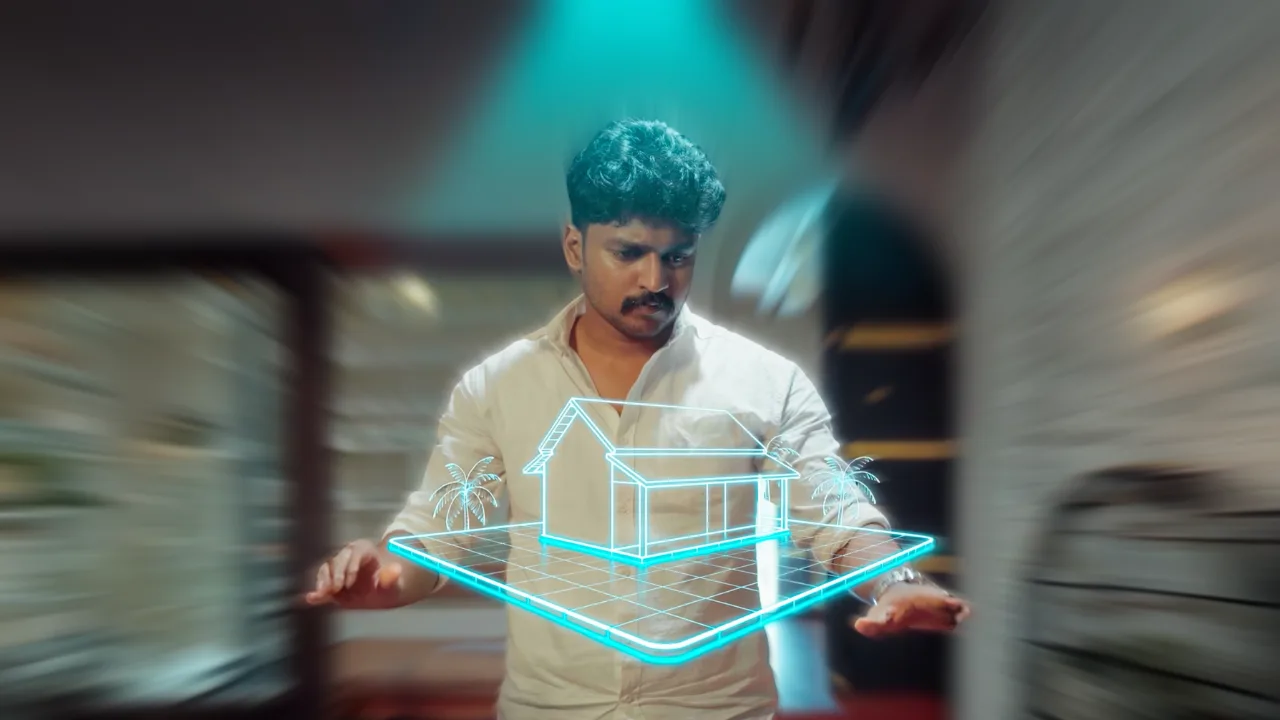 Frame from the QSolar ad film — a holographic solar home projected over a table